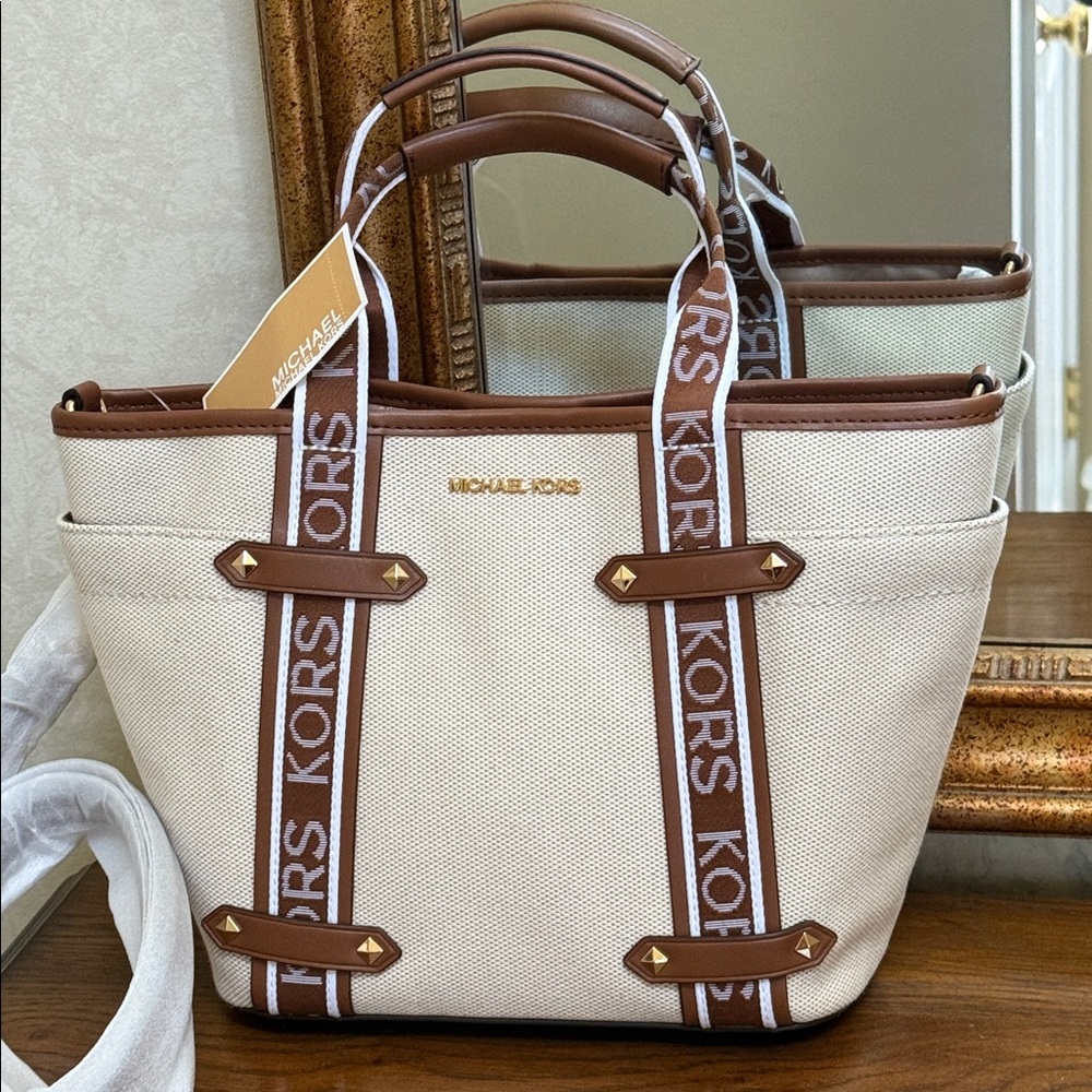 Michael Kors Cream and Brown women’s small tote or crossbody bag.